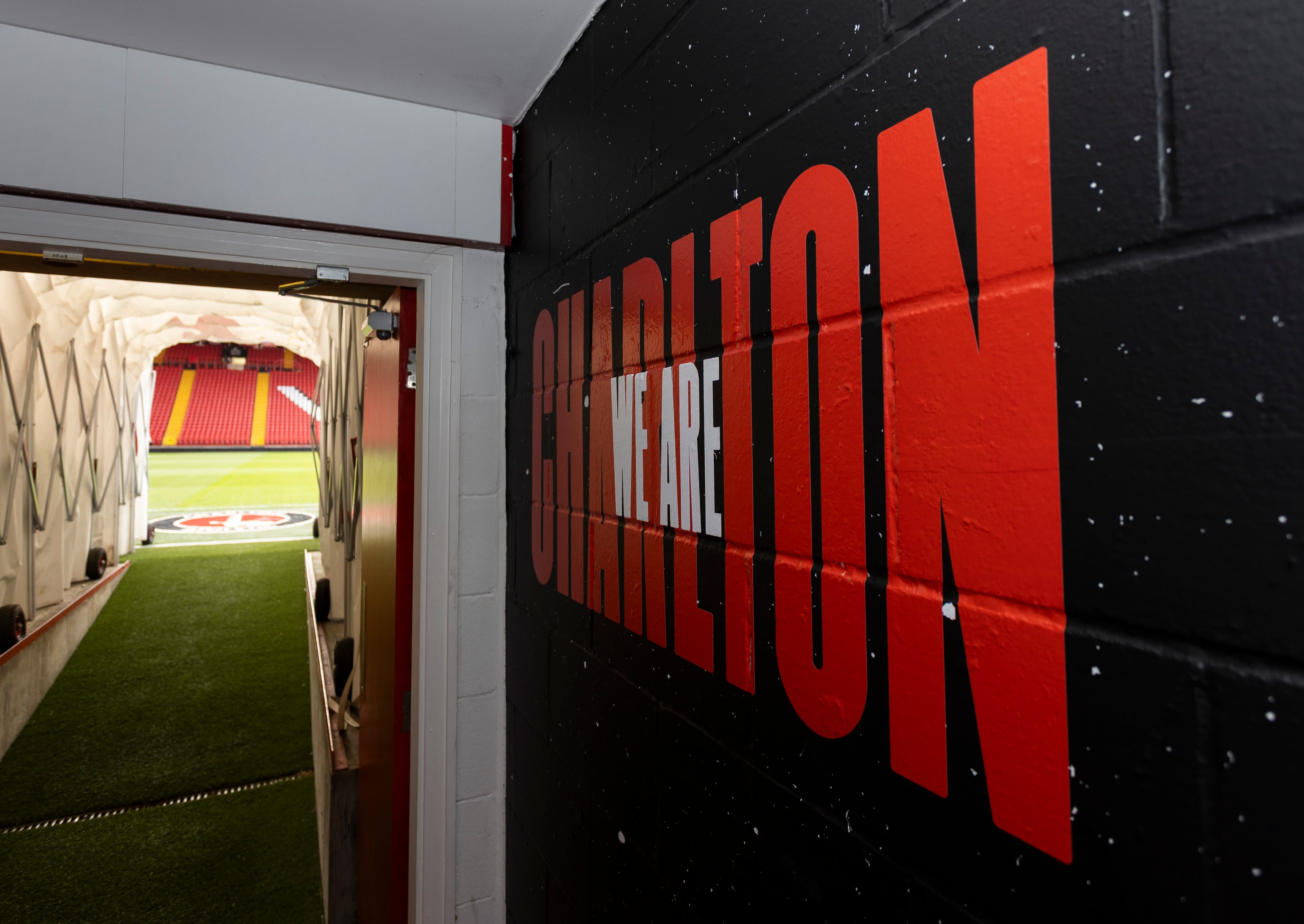 We Are Charlton wall graphic looking out toward the pitch